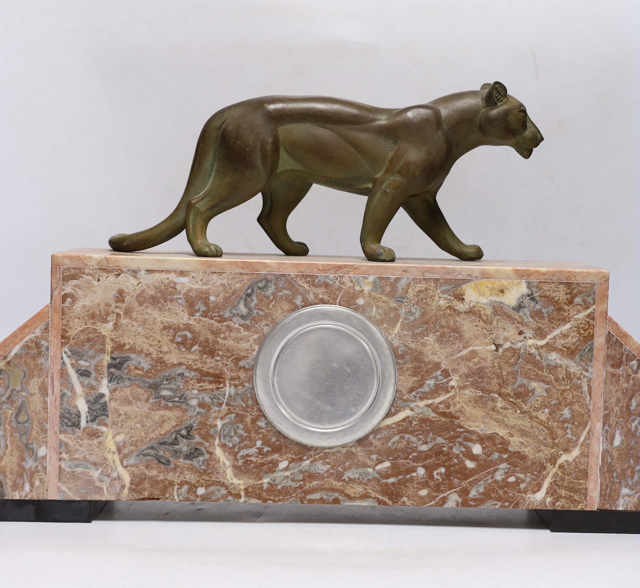 An Art Deco marble clock garniture, 1930’s with ‘panther’ mount